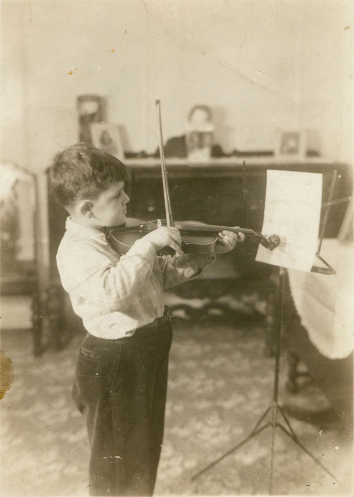 Playing the violin at age 5
